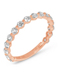 rose gold single shared prong ring