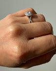 Double Halo Infinity Twist Ring